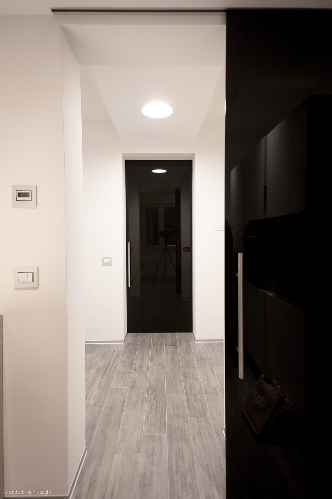 Casa PS - porte scorrevoli in vetro nero